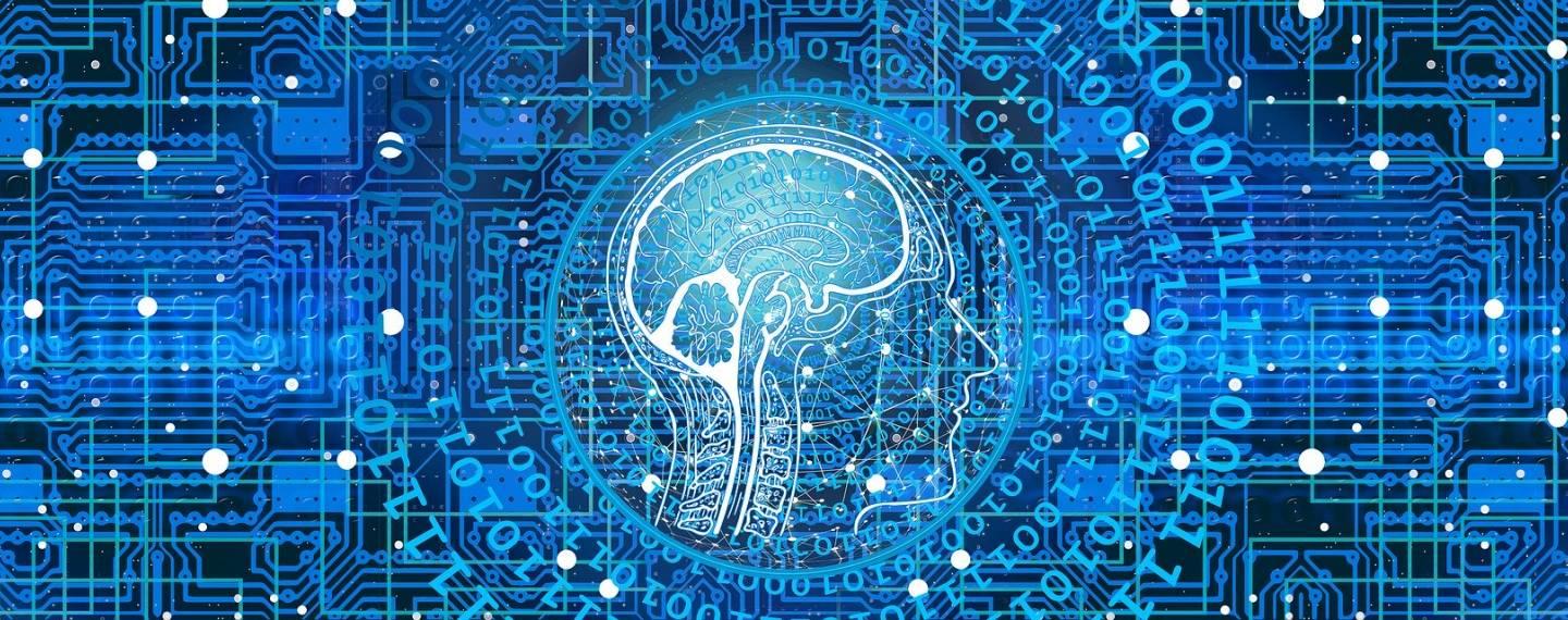 A graphic of a brain scan superimposed over a digital field of 1s and 0s