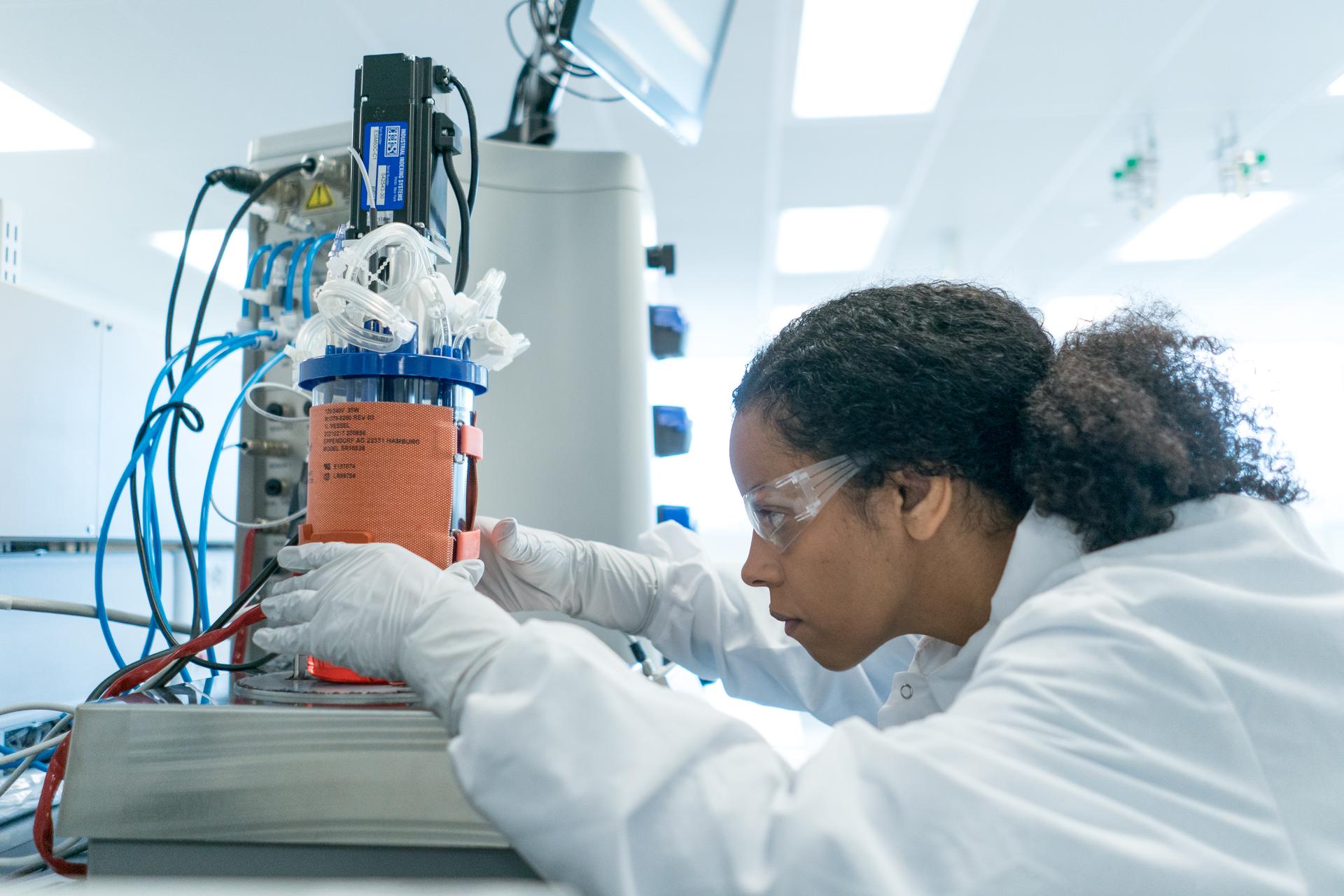 Researcher working in a lab at OmniaBio's facility in Hamilton, Ontario