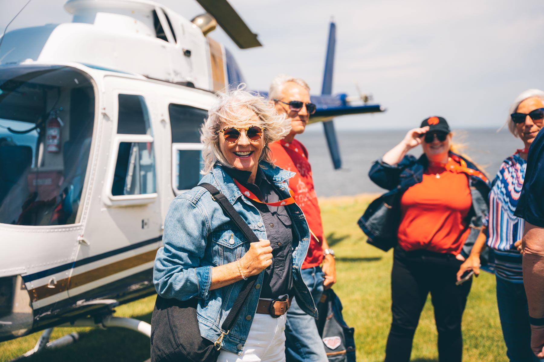 a person getting on a helicopter