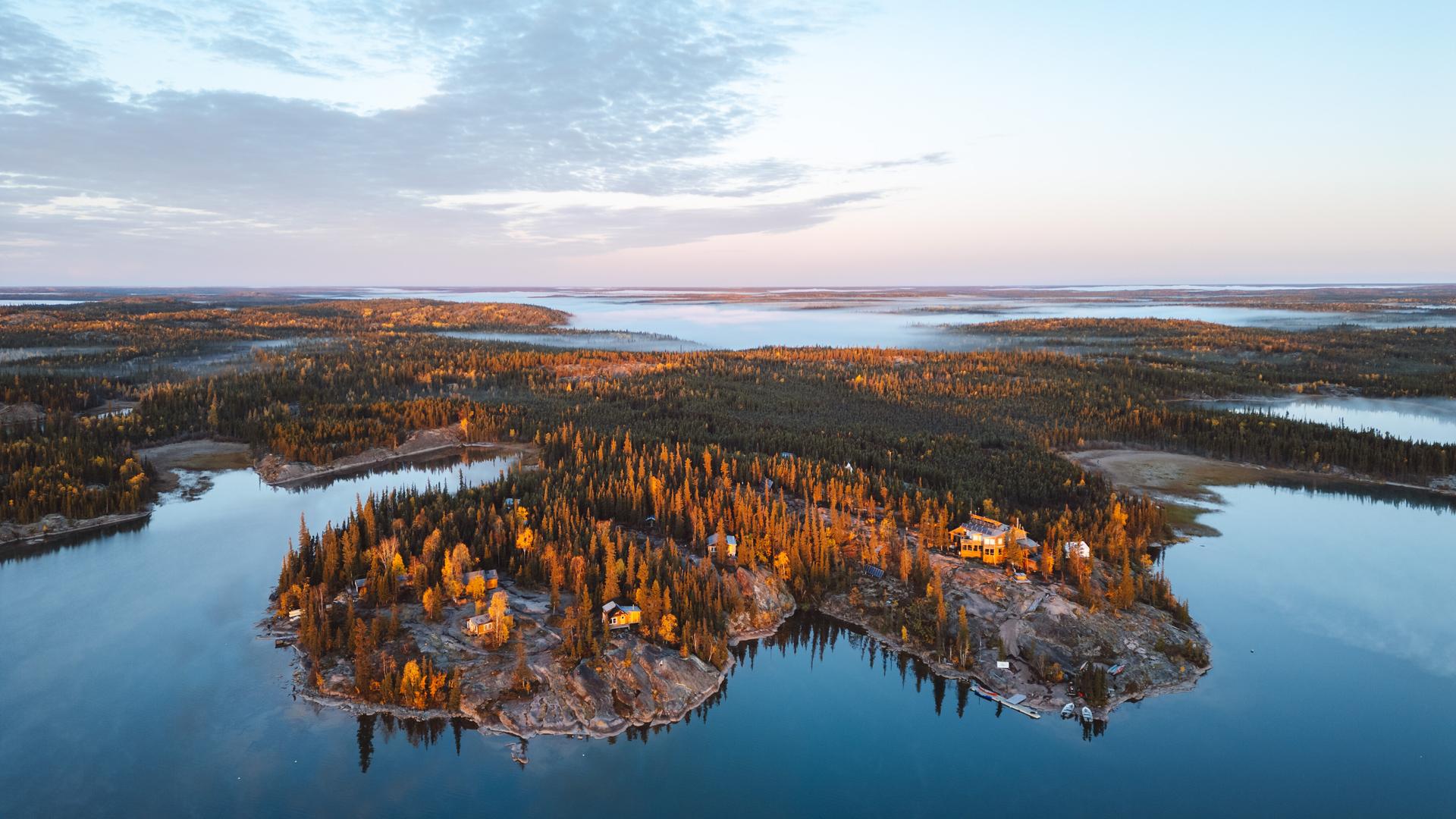 Aerial view of Blachford Lodge surrounded by calm lakes