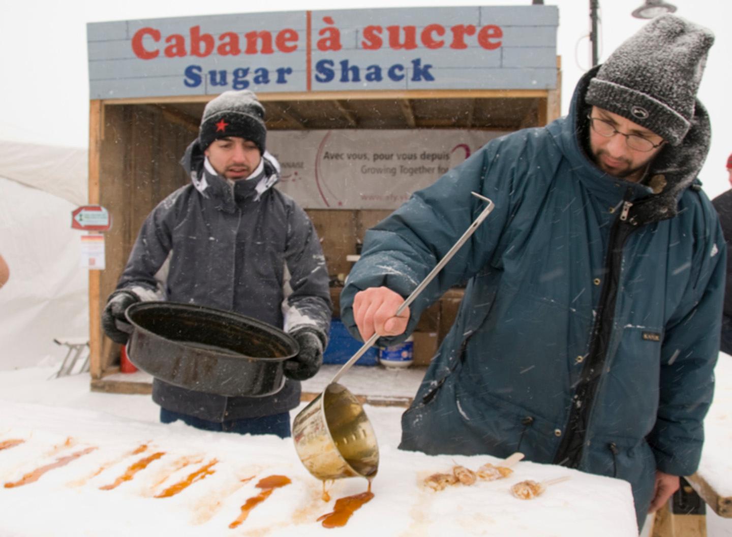 Cabane a sucre - a wintertime tradition combining snow and maple syrup for a sweet treat